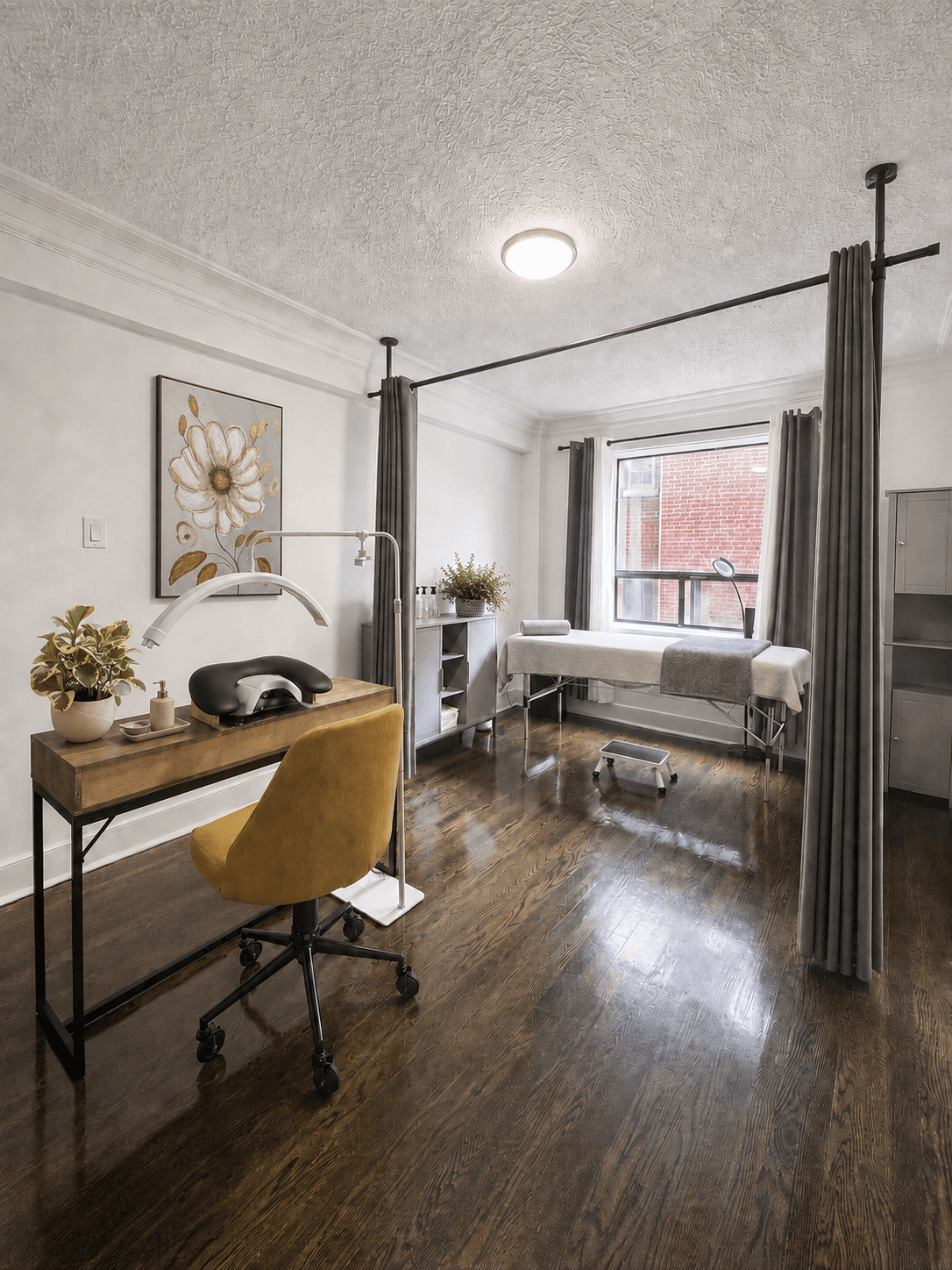 A softly lit VYRO treatment room with a massage table and warm neutral decor