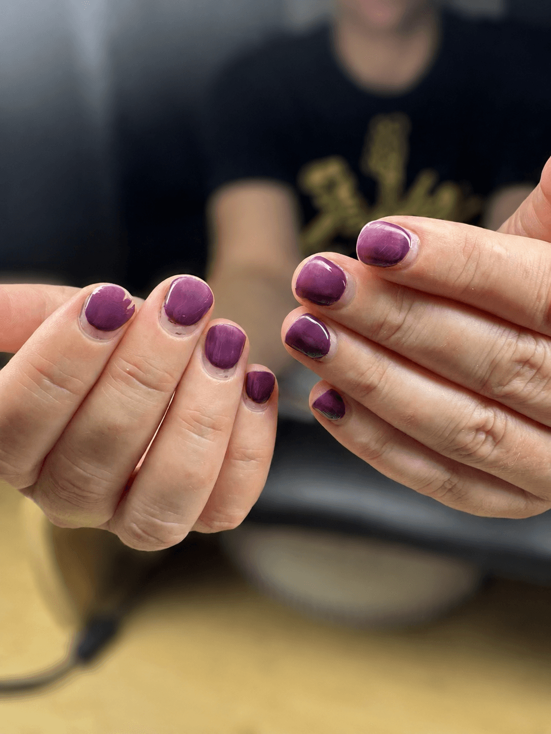 Plum gel manicure before a VYRO colour change
